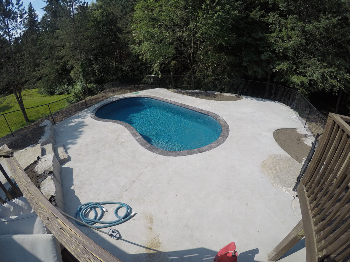 Fiberglass Pool, Armour Stone Retaining Wall, Steps, Concrete Pad - Drake