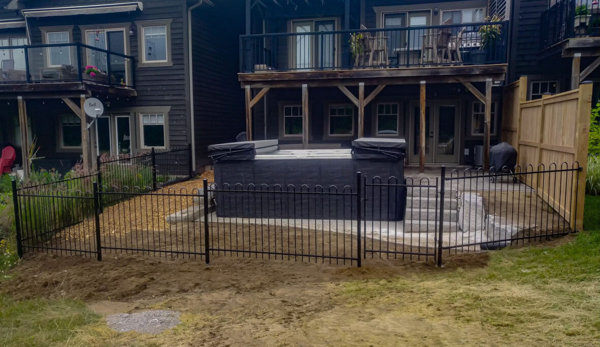 Wrought Iron Fence, Wood Fence, Concrete Steps, Armour Stone, Interlock, Concrete Pad, Transported Swim Spa